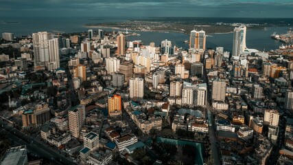 a cityscape with an aerial view and a lake