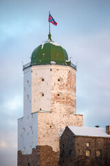 Ancient St. Olaf's tower close-up on a February evening. Vyborg Castle. Leningrad region, Russia