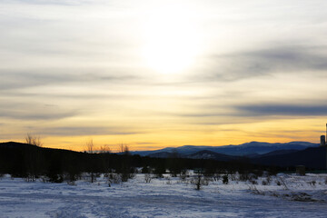 Beautiful yellow sunrise in winter
