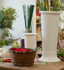  Serene Floral Abundance in Workbench with white jar and petal rose in basket