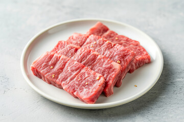 Japanese Wagyu beef on the white plate on the white table
