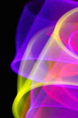 Neon Wavy Rainbow Swirls and Lines on Black Background