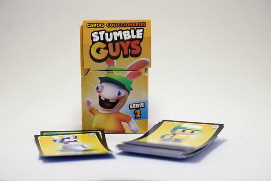 Stumble Guys collectible card game. Board game for children with the characters from the video game Stumble Guys in collaboration with the rabbits from Rabbids invasion. Isolated white.ground, 