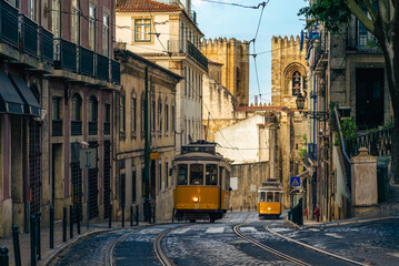 classic and touristy route, number 28 tram of lisbon in portugal - obrazy, fototapety, plakaty