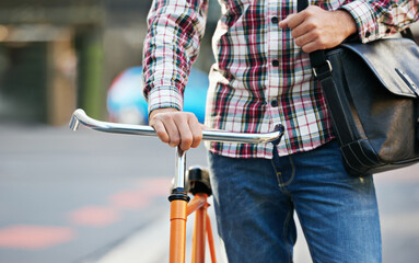Hands, person and push bicycle in street to travel on eco friendly transport outdoor, commute or...