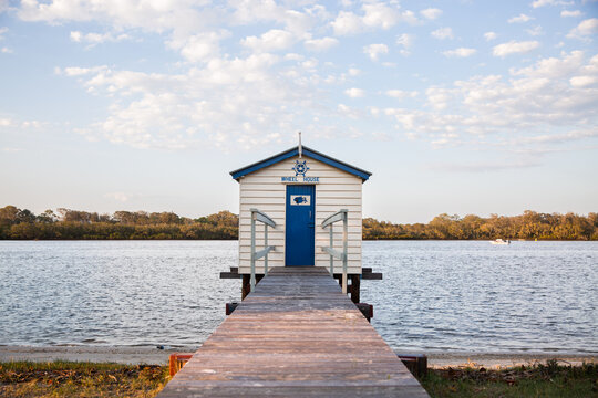 an old boat house on a river on the Sunshine Coast
