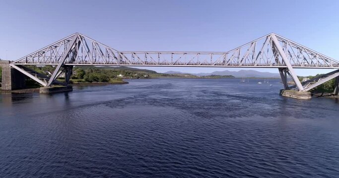 Aerial video of the Connel Bridge near Oban on a sunny day, Scotland