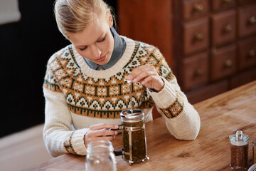 Woman, thinking and herbal tea to relax in home and warm beverage of herbs mixture for health....