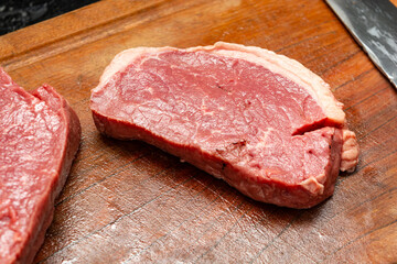 Steaks being prepared for barbecue party