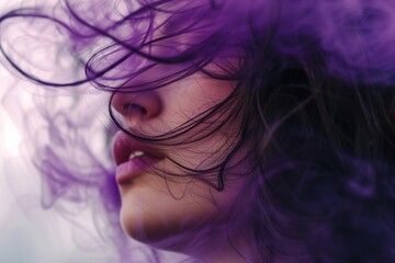 closeup of face with purple smoke hair blowing sideways