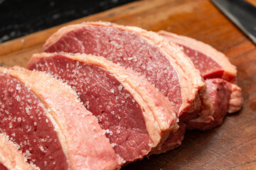 Steaks being prepared for barbecue party