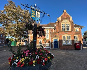 Maldon town sign with the historic police station building in the background, Essex, UK. 