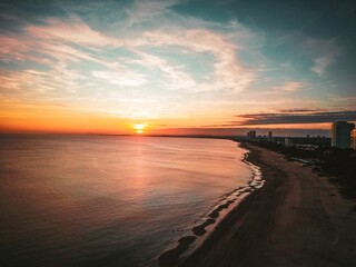 An aerial view of a beautiful sunset over Punta del Este beach