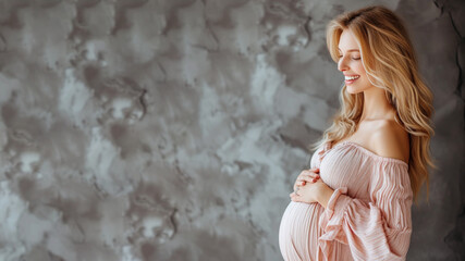 Blonde pregnant woman with pregnancy belly, in soft pink clothes