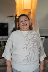 Fototapeta premium Portrait of smiling senior woman at home