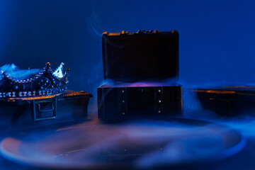Mysterious chest, key and book on a dark background. Panoramic mockup for your logo. Horizontal...