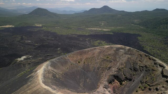 Drone footage of the volcanic mountain of Paricutin on a sunny day in Michoacan state, Mexico
