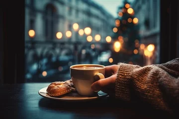 Foto op Plexiglas Hands close up holding coffee cup in cafe.  © Oksana