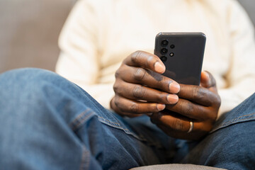 Close-up of senior man using smart phone