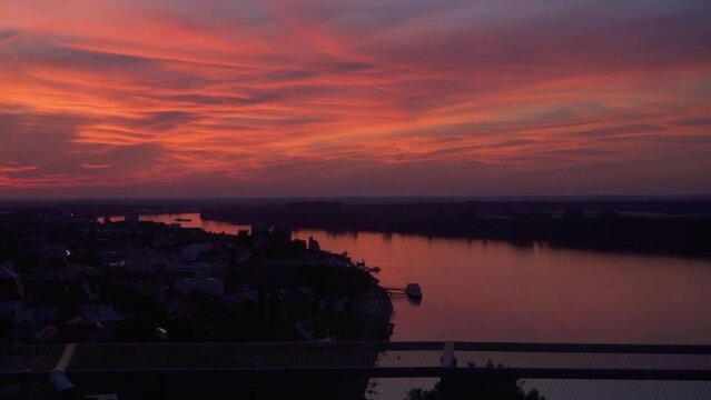 Extra colorful pink and orange landscape above Vukovar city near the Danube river litle city village 