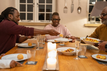 Family eating dinner together at home