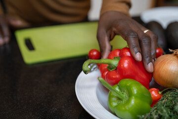 Man cutting vegetables for dinner