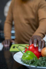 Man cutting vegetables for dinner