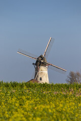 The Mill on the Seven Roads and landscape view, at Denderwindeke near Ninove in East Flanders, Belgium.