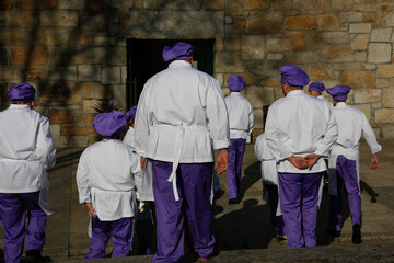 Group of cooks. Cooking students with their backs turned