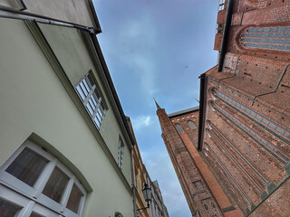 Fototapeta na wymiar Low angle view of St. George’s Church in Wismar, Germany