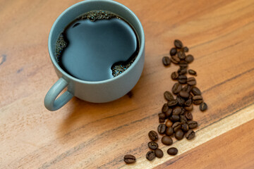 Kaffeetasse mit Kaffeebohnen