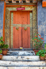 Old door - exterior of Lhuntse Dzong Monastery in Bhutan, Asia