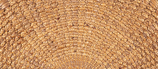 Naklejka premium background and texture of wicker straw surface