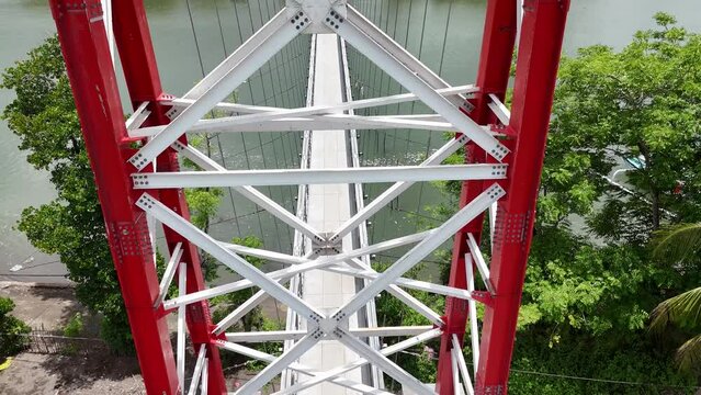 Suspension bridge for crossing

connecting Puyahan Village with Cemara Village. Lombok - NTB - Indonesia