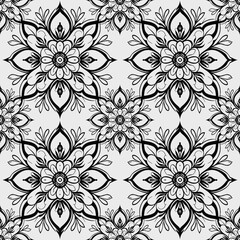 Seamless pattern with mandalas in black and white colors