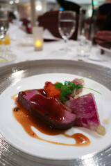 Roasted duck breast with seasonal vegetables sauce pois breve