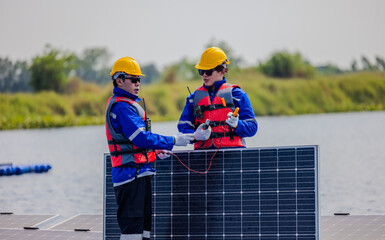 Technicians check floating solar farm wiring, polarity, and grounding for reliability and safety