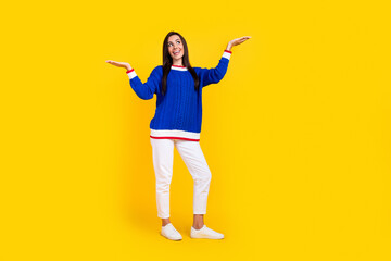 Full length photo of hispanic promoter girl in blue stylish jumper compare advantage language...