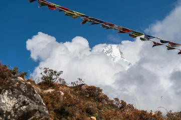 Papier Peint photo autocollant Ama Dablam View of Ama Dablam mountain in clouds during trekking in Nepal. EBC Everest Base Camp or Three passes trek in Nepal. Mountain range Himalayas in Pangboche village, the Khumbu region of Nepal, Asia.