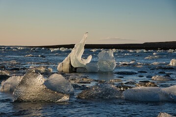 some very small pieces of ice that are floating in the water