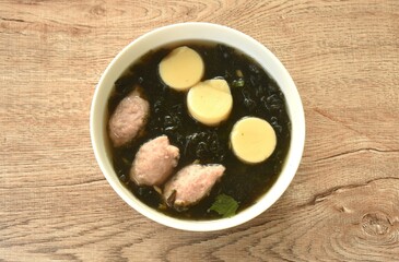 boiled egg tofu with mashed pork and seaweed soup on bowl 