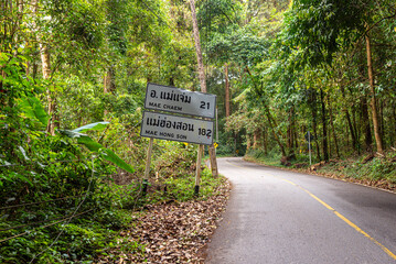 Kilometers on a road sign in Doi Inthanon National Park in Thailand. The route through northern Thailand is called the Mae Hong Son Loop and is famous among motorcyclists