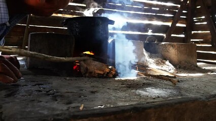 hole in the fire of a wood stove made of artisanal cement, used in Latin American towns to prepare food in the traditional way