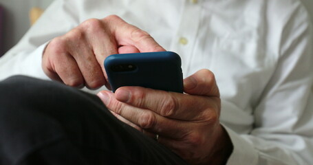 Older man using cellphone device
