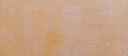 Faded orange paint cement wall texture