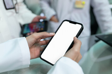 Doctors are pointing on smartphone