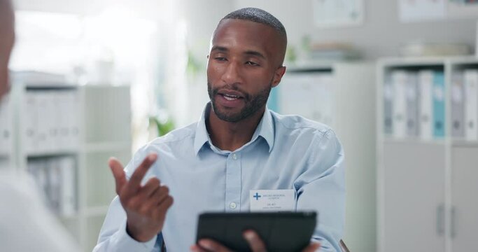 Black man, doctor and tablet with patient for consulting, diagnosis or steps in healthcare at hospital. Person or medical employee talking or explaining with technology in consultation for checklist