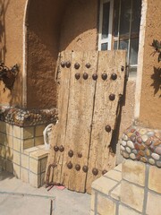 Old wooden door in Iranian city