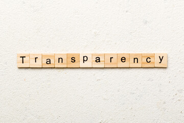 transparency word written on wood block. transparency text on table, concept