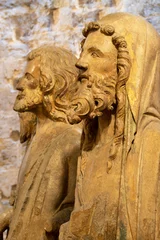 Fotobehang VALENCIA, SPAIN - FEBRUARY 14, 2022: The detail of statue of apostle from Puerta de los Apostloles gate in the Cathedral by Nocolas de Autun from first part of 14. cent.. © Renáta Sedmáková